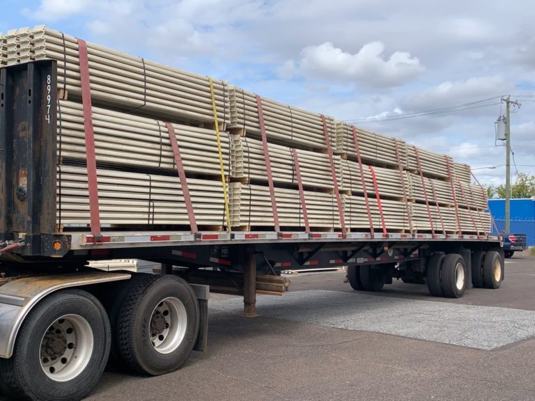 Flatbed full of 108" teardrop step beams