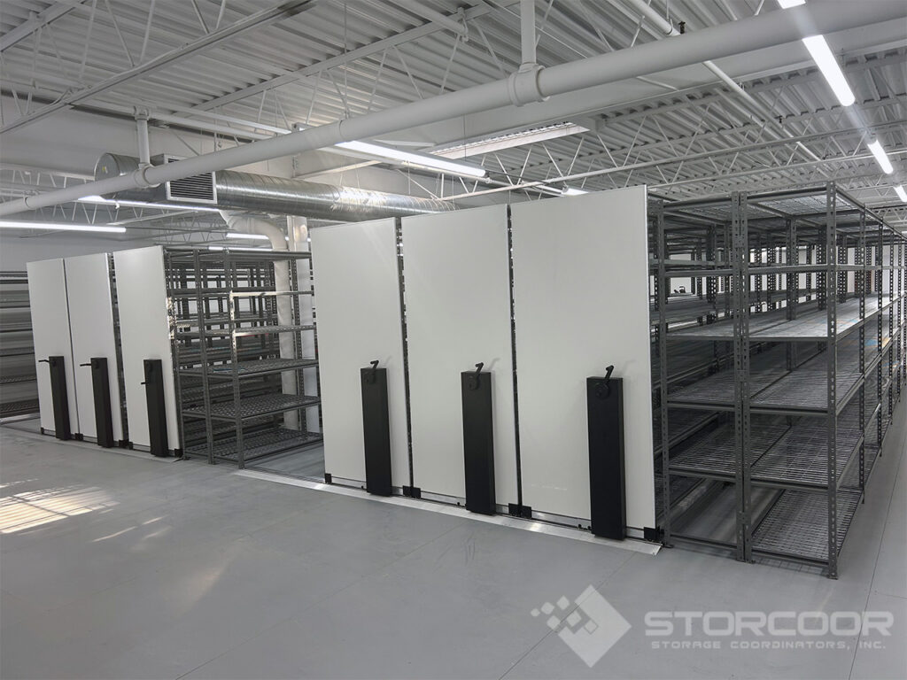 Mechanical mobile shelving system for high-density storage